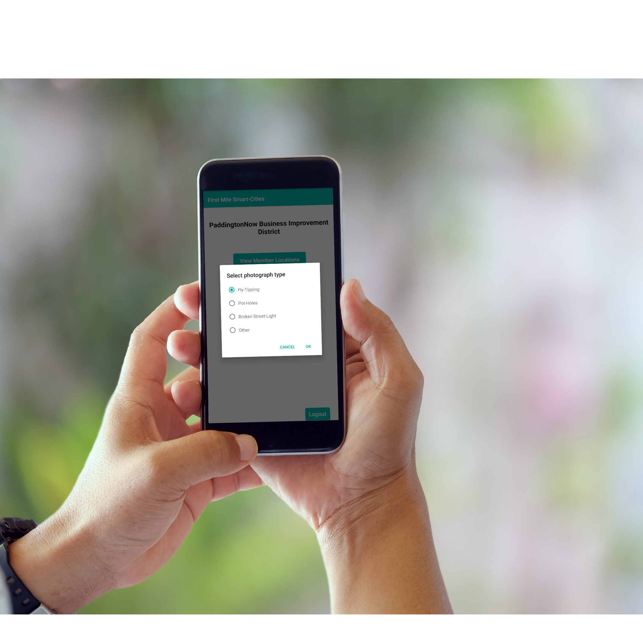 Phone with Smart Cities app being held by hand